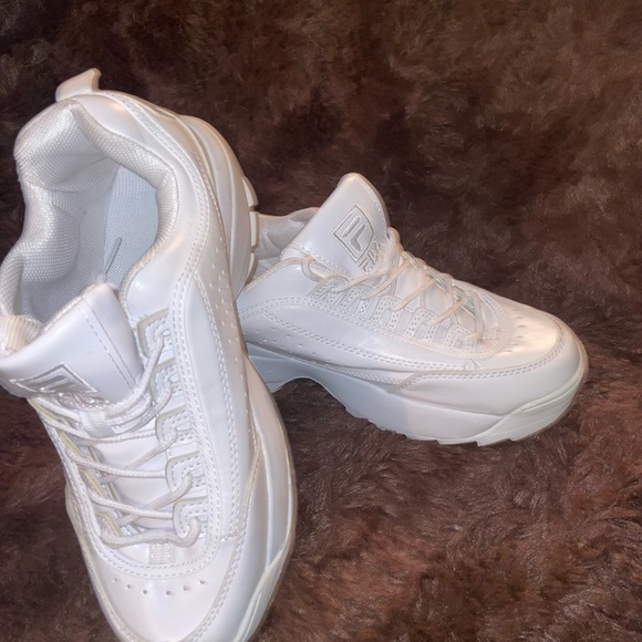 Uggs Nikes brand new. Filas were worn once.Nike’s a 7 1/2 the Uggs and Filas 7. - Picture 4 of 6